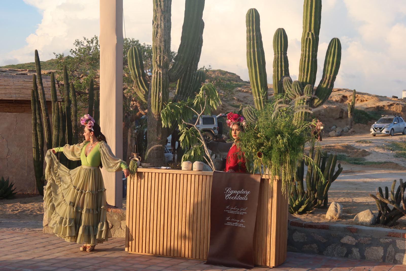 Signature cocktail bar among tall cardón cacti